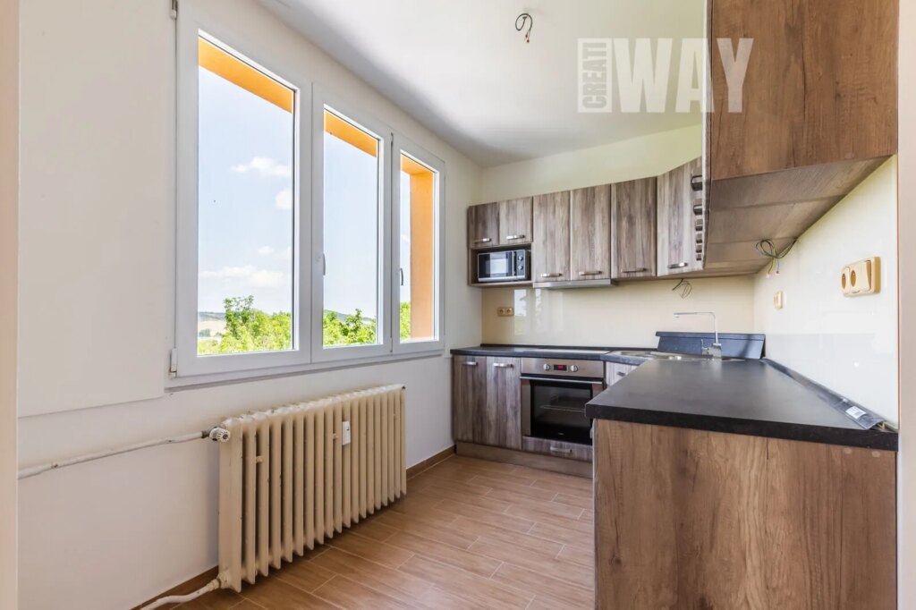 ČTYŘPOKOJOVÝ BYT V LOUNECH S VÝHLEDEM, KTERÝ JINDE NEUVIDÍTE